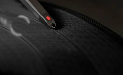 Dj record turntable. macro closeup of the needle on a 12 inch vinyl lp playin Stock Photos