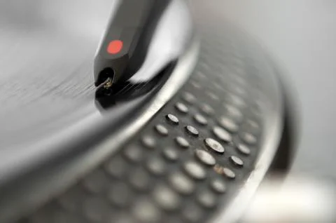 Dj record turntable. macro closeup of the needle on a 12 inch vinyl lp playin Stock Photos