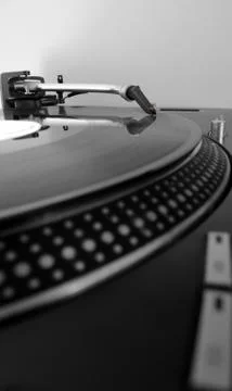 Dj record turntable. macro closeup of the needle on a 12 inch vinyl lp playin Stock Photos