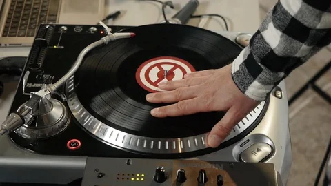 DJ Rotates The Vinyl Record Stock Footage 100084076