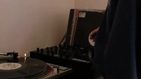 Dj scratch, the vinyl record is spinning on the player (gramophone) Stock Footage 106138741