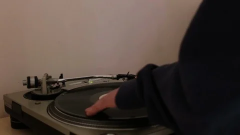 Dj scratch, the vinyl record is spinning on the player (gramophone) Stock Footage 106138765
