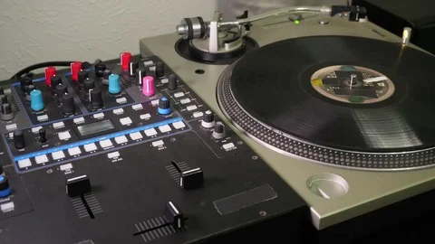 DJ scratching and cutting it up on turntables. Stock Footage 79333279