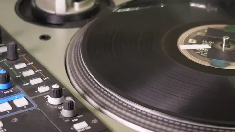 DJ scratching and cutting it up on turntables. Stock Footage 79368087