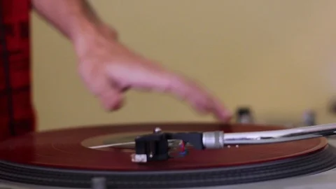 DJ Scratching Red Vinyl Record on Vintage Pickup 스톡 동영상 112835073