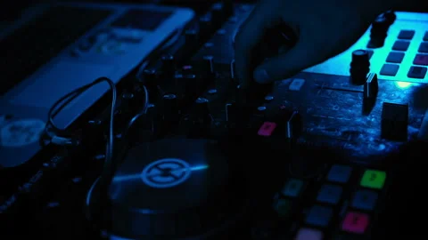 DJ sets up the mixing console Video stock 93345533