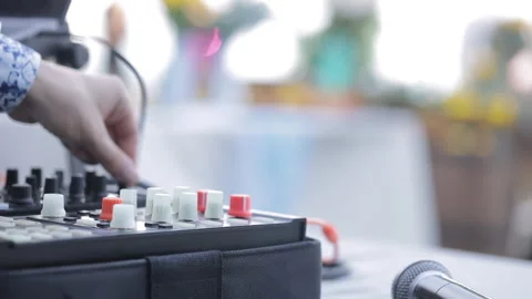 Dj setting up sound console Stock Footage 252829663