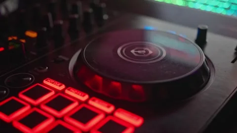 DJ sound control console Buttons sliders, playing electronic music on mixing Stock Footage 319311756