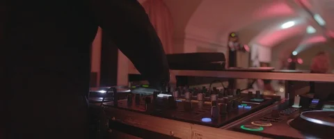 DJ sound control console for mixing dance music in disco club Stock Footage 120199952