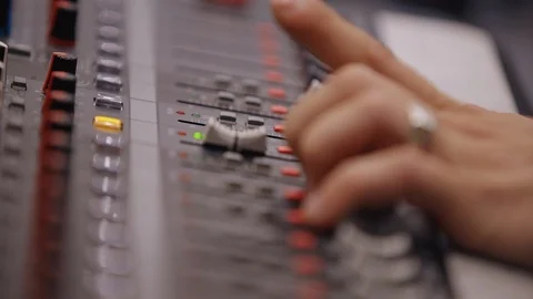 DJ sound control console for mixing dance music and laptop in disco club. Hands Stock-Footage 121272267