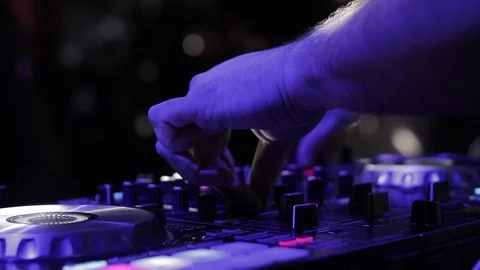DJ sound control console for mixing dance music and laptop in disco club. Stock Footage 126265682