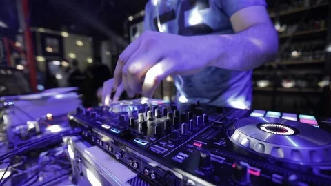 DJ sound control console for mixing dance music and laptop in disco club. Stock Footage 126265708