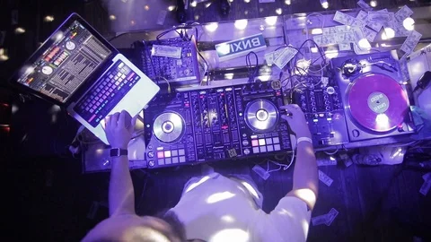 DJ sound control console for mixing dance music and laptop in disco club. Video stock 126266393