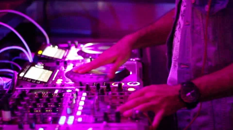 DJ Spinning at Night Club Stock Footage