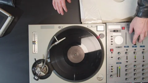 DJ spins the record. Top view. Slowmotion Video stock 129971220