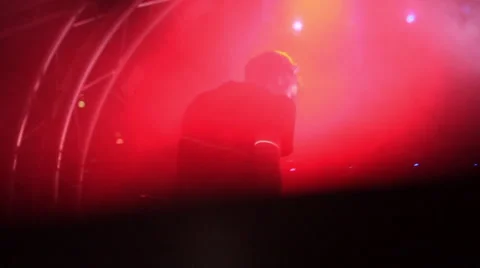 DJ on the stage performing Stock Footage 49696746