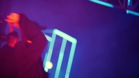 DJ stand behind the DJ booth and dance Stock Footage 127036832