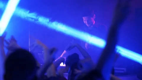 DJ Standing and Looking at the Party Stock Footage 71764900