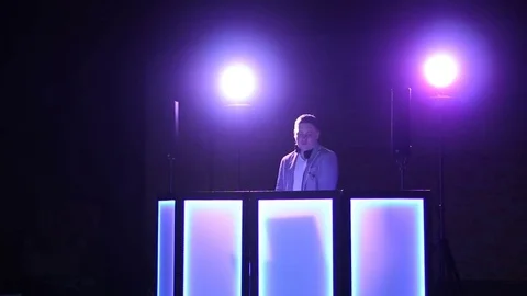 DJ Standing in Front of the DJ Console Stock Footage 82176652