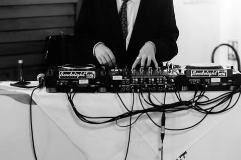 DJ table with cables runnning down Stock Photos