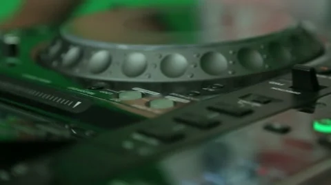 DJ turn the knobs on the mixer close up 스톡 동영상 61220499