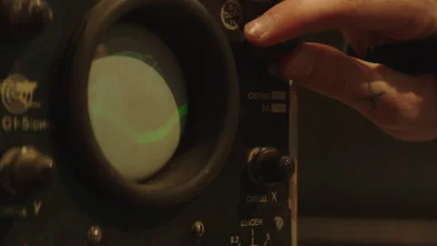 DJ turning knobs on a device 스톡 동영상 283259164