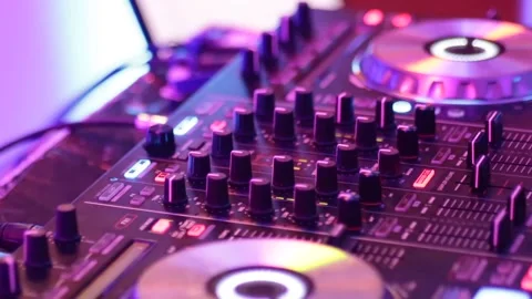 DJ turning knobs on DJ board Stock Footage 152851333