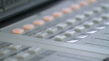 DJ turning the volume up and pushing a button Stock Footage 85503976