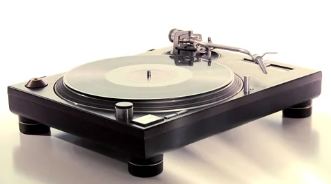 DJ Turntable. Dropping the needle on a spinning vinyl record player Stock Footage 46318915