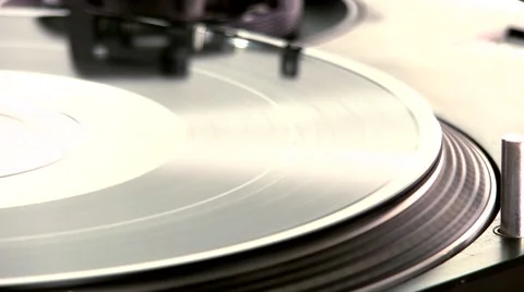 DJ Turntable. Dropping the needle on a spinning vinyl record player Stock Footage 46318972