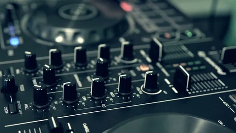 DJ tweak track controls on DJ control panel. Stock Footage 91601474