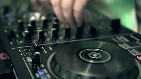 DJ tweak track controls on DJ control panel. Stock Footage 91601962