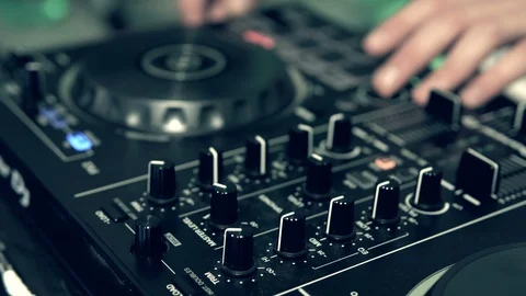 DJ tweak track controls on DJ control panel. Stock Footage 91602047