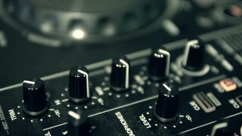 DJ tweak track controls on DJ control panel. Stock Footage 91607564