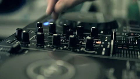 DJ tweak track controls on DJ control panel. Stock Footage 91618682
