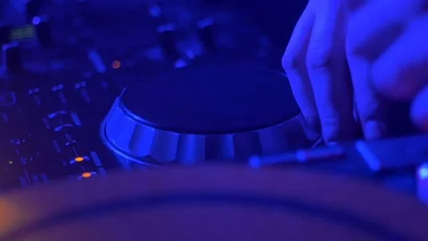 DJ twirls the instruments on the mixer Stock Footage 81783083