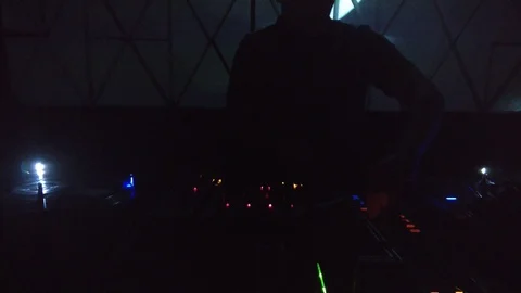 The DJ twists the knobs on the mixing console for mixing 스톡 동영상 88208535