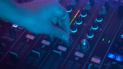 Dj uses console, stroboscopic light and smoke, gimbal 4k shot Stock-Footage 152425406