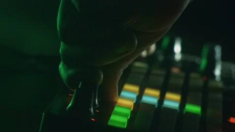 Dj Uses Midi Controller to Play Music at Techno Party Stock Footage 115577797