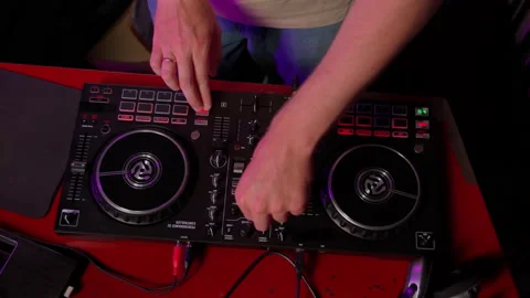 DJ using console in club close up. Male person touching buttons on device Stock Footage 201481687