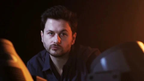 DJ Using Head Spots Which Give Light in Different Colors Stock Footage 71812317
