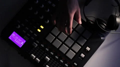 DJ using his Drum Machine Stock Footage 45333129