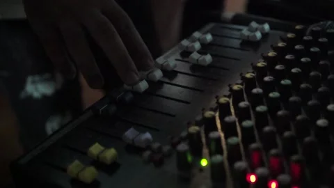 A Dj Using His Mixer Turn Up The Volume Stock Footage 157650453