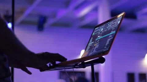 Dj using lap top mixing music Stock Footage 63562615