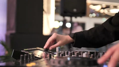 Dj  is using a music mixer Stock Footage 172145925