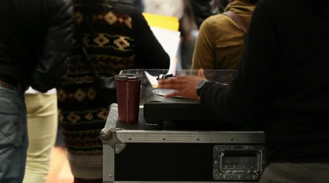 DJ  using a turn table ,outdoor party Stock Footage 30237409