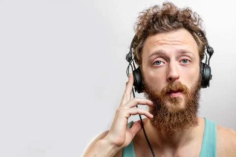 DJ at work in front of white background Stock Photos