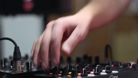 DJ working on the audio mixer Stock Footage 72705051
