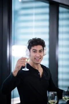 DJ working with Digital Mixer &amp; Controller in celebration party Stock Photos