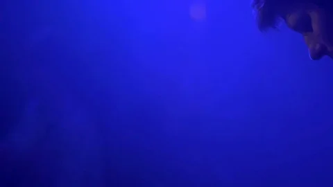 DJ is working at the remote at the party Stock Footage 81782063